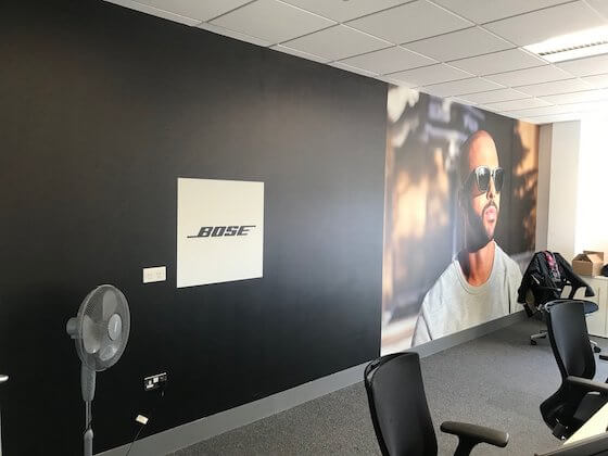 Printed one piece wall graphics installed by Wallace Print at Bose head offices.