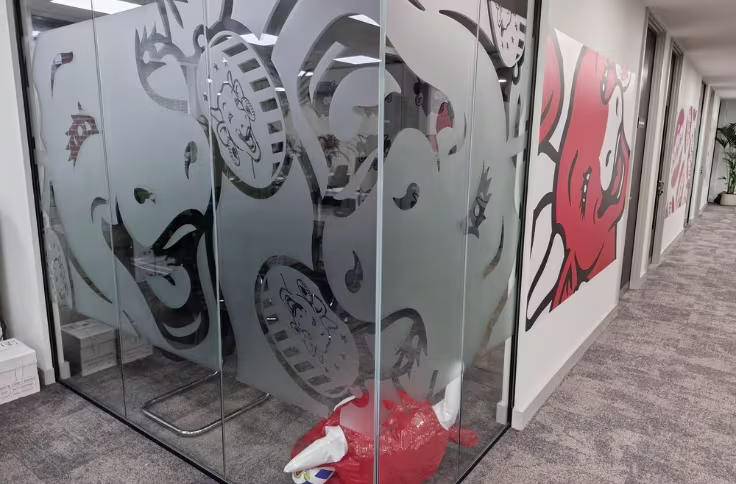 Branded manifestation vinyl applied to glass office doors