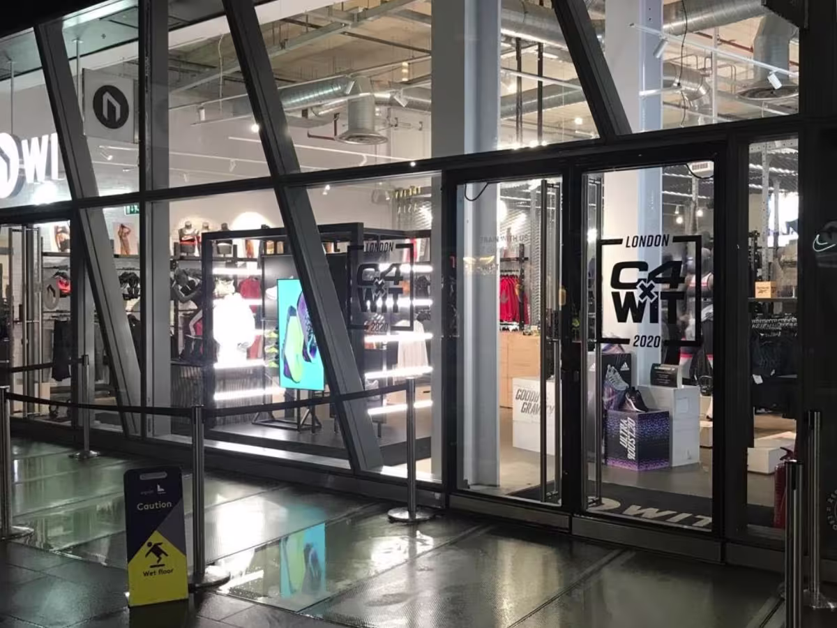 Cut window vinyl with C4 branded graphics applied to commercial glazing