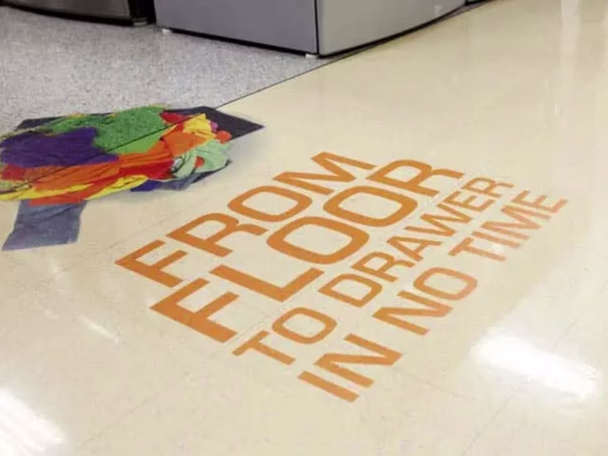 Clear printed floor vinyl applied over an existing decorative floor surface