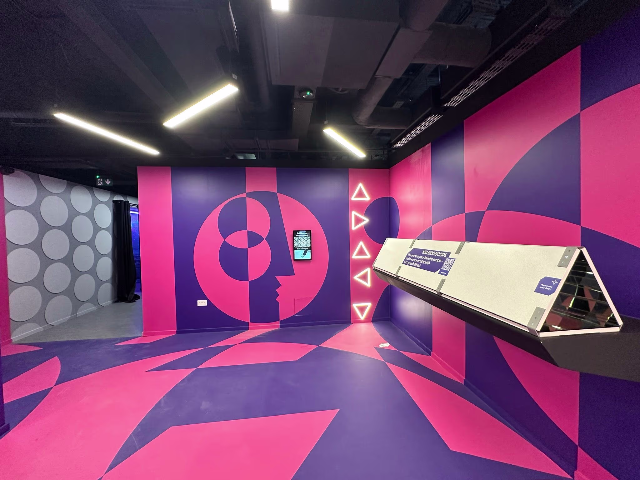 Internal printed floor vinyl with bold promotional branding in a retail environment