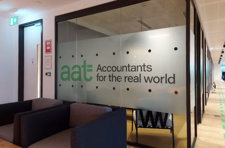 Glass manifestation vinyl with AAT Accountants branding on an office partition