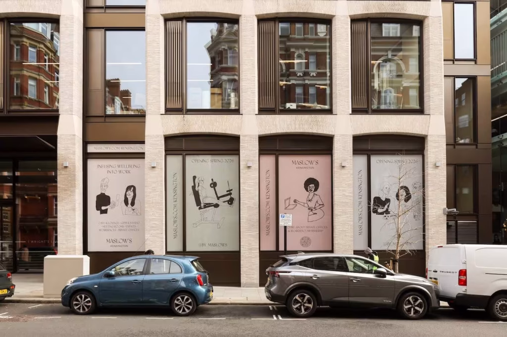 Maslows Kensington 3 Close-up of Maslows Kensington window graphics featuring illustrated workspace and wellbeing campaign designs.