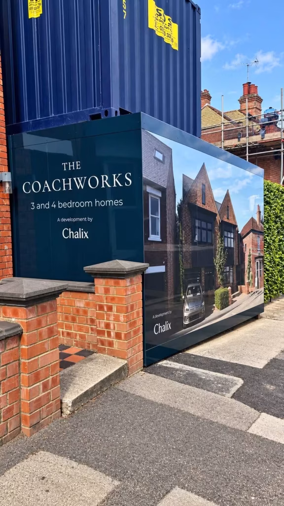 Chalix Coachworks Development Hoarding 1 Dark green Coachworks development hoarding with Chalix branding and project information.