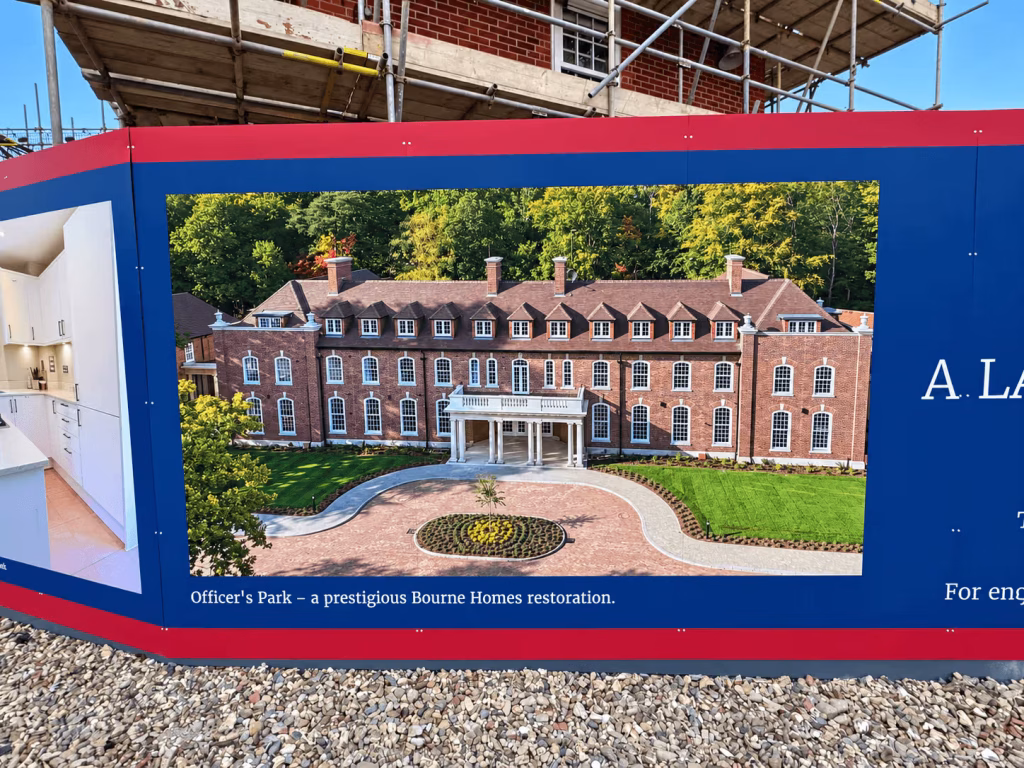 Sergeants Mess Hoarding, Mindenhurst 2 Curved ACM site hoarding featuring an exterior image of the Officers Park development.
